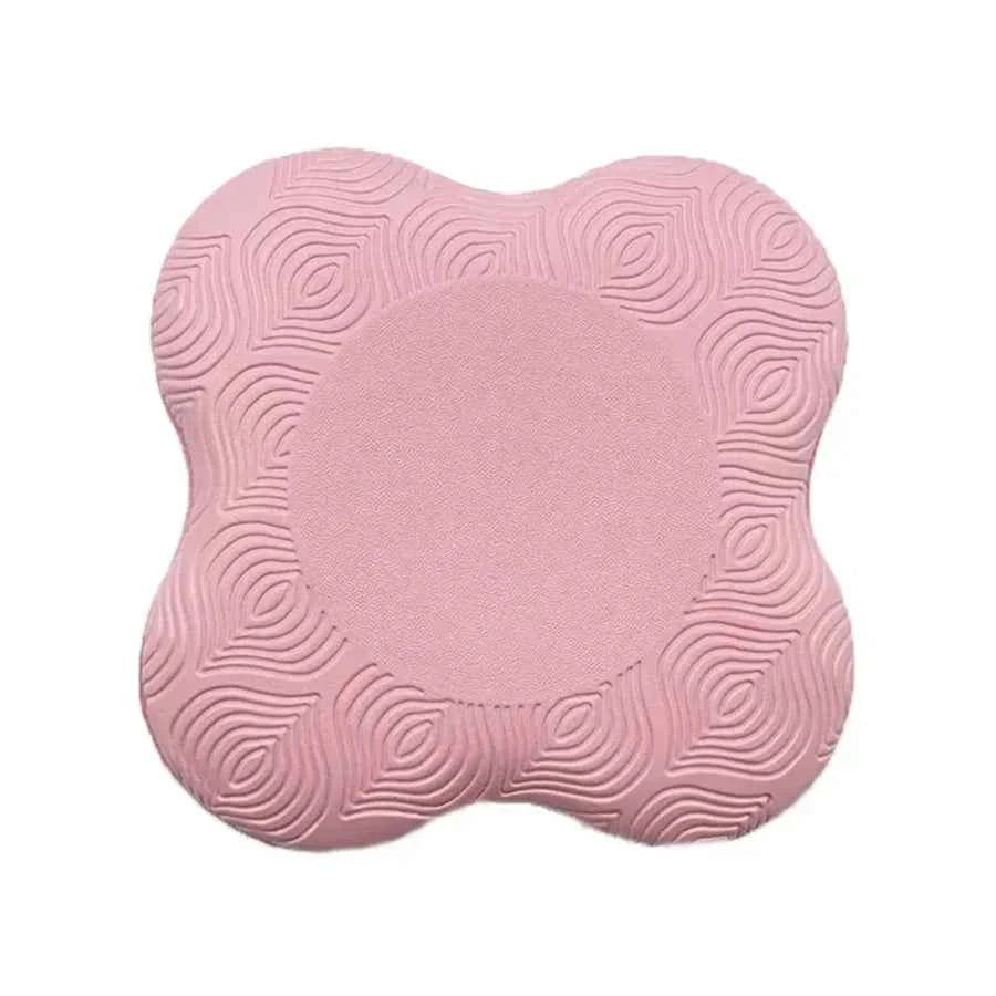 Pink yoga knee pad, heart-shaped cushion with raised spiral texture