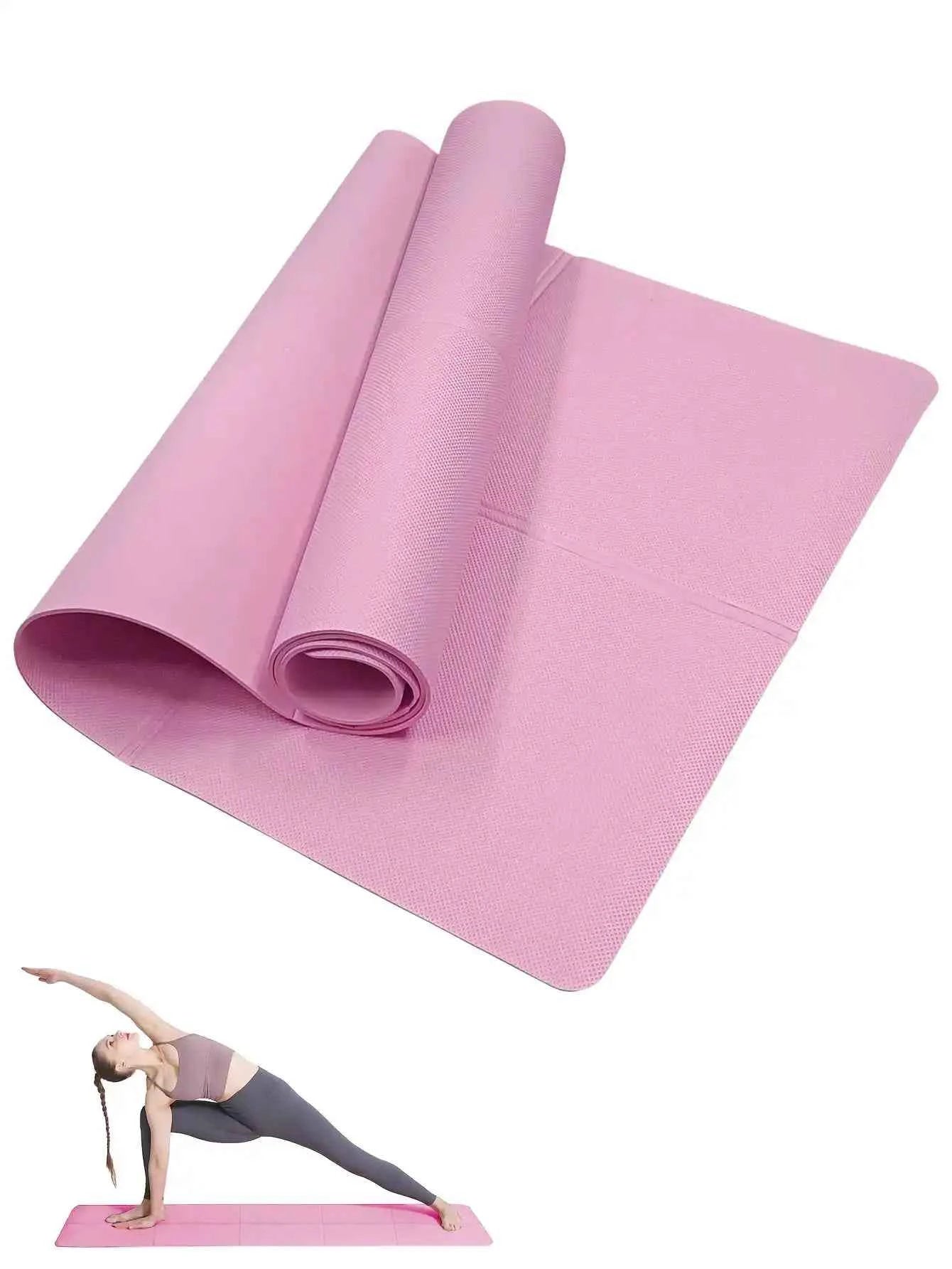 Pink non-slip yoga mat, multi-thickness design, rolled showing layered thickness.