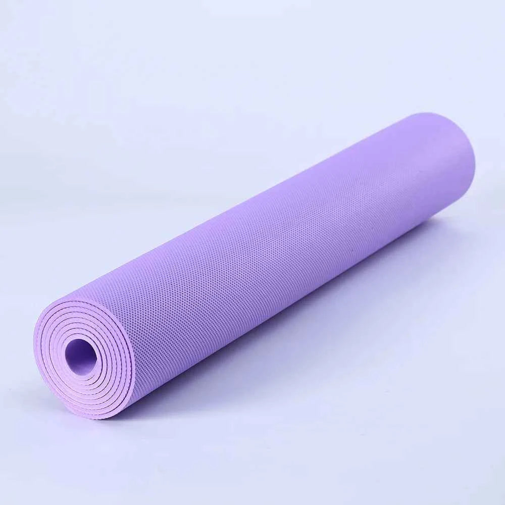 Purple PVC yoga mat roll with textured top and non-slip grip
