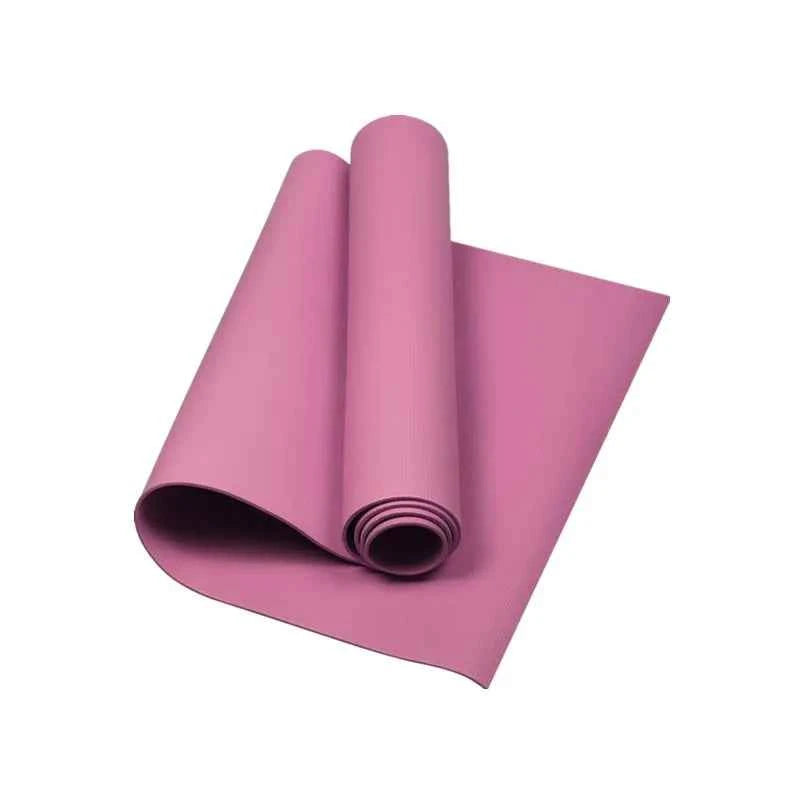 Pink yoga mat rolled with textured non-slip surface and rounded edge