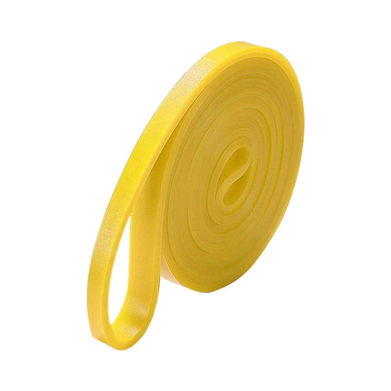 Coiled yellow elastic loop resistance band